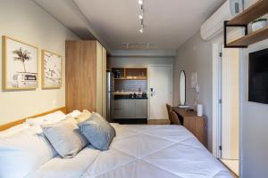 Cama ou camas em um quarto em 360 Ambience Vila Mariana