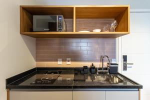 A cozinha ou cozinha compacta de 360 Ambience Vila Mariana