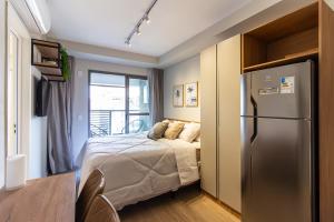 Cama ou camas em um quarto em 360 Ambience Vila Mariana