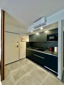 Kuchyň nebo kuchyňský kout v ubytování Apartment Sara IV