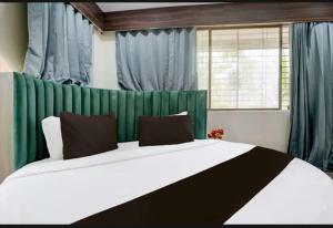 Postel nebo postele na pokoji v ubytování Hotel swagat inn bopal