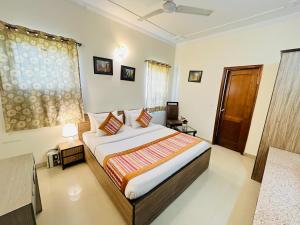 Postel nebo postele na pokoji v ubytování Persona International Hotel Karol Bagh Delhi