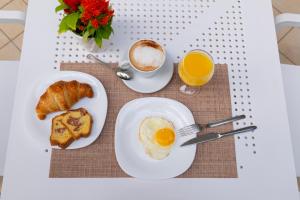 Opções de café da manhã disponíveis para hóspedes em Hotel Negresco