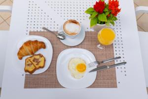Opções de café da manhã disponíveis para hóspedes em Hotel Negresco