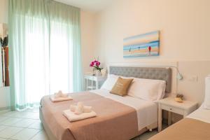 Cama ou camas em um quarto em Hotel Negresco