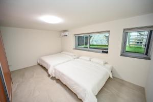 Letto o letti in una camera di Douhao B&B