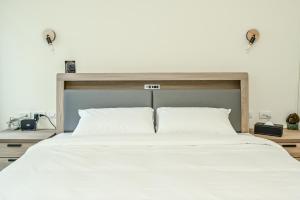 Letto o letti in una camera di Douhao B&B