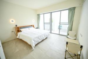 Letto o letti in una camera di Douhao B&B