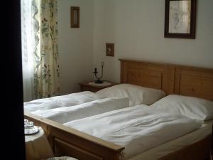 Postel nebo postele na pokoji v ubytování Villa Olivia