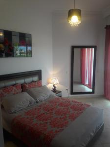 Rúm í herbergi á Seaside Splender appartement