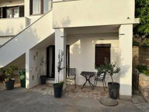 Ein Balkon oder eine Terrasse in der Unterkunft Villa Beba - Apartments