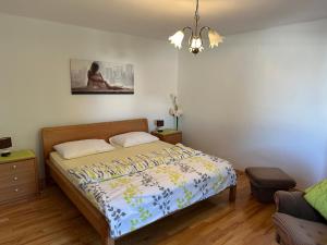 Ein Bett oder Betten in einem Zimmer der Unterkunft Villa Beba - Apartments