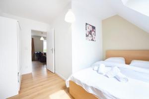 Ένα ή περισσότερα κρεβάτια σε δωμάτιο στο RB-2G - Appartement F2 au 2ème étage de 1 à 4 pers