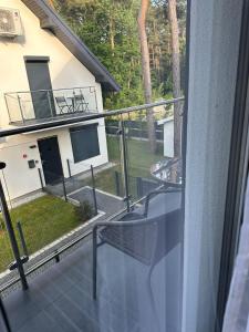 Balkón alebo terasa v ubytovaní Apartament Mushellka - Dziwnówek Horizon Park , 2 sypialnie i salon