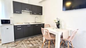 Kuchyňa alebo kuchynka v ubytovaní Apartments Brajde