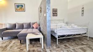 Posteľ alebo postele v izbe v ubytovaní Apartments Brajde