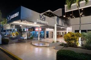 a building with a sign that reads davisoice at Hotel Margarita Dynasty in Porlamar