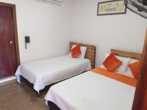 Postel nebo postele na pokoji v ubytování Hotel Campestre Maguey