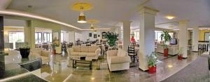 a lobby with couches and chairs in a building at Theofilos Classic Hotel in Petra