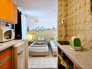 Kuchyňa alebo kuchynka v ubytovaní Apartment for Cyclists RIDE IN Balatonalmádi