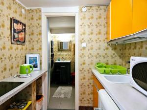 Kuchyňa alebo kuchynka v ubytovaní Apartment for Cyclists RIDE IN Balatonalmádi