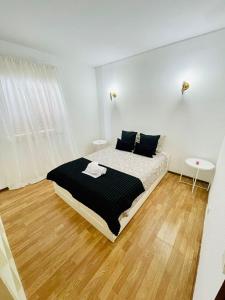 Postel nebo postele na pokoji v ubytování Apartament Two bedrooms Praia de Quarteira