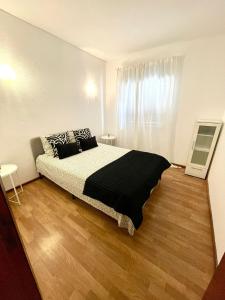 Postel nebo postele na pokoji v ubytování Apartament Two bedrooms Praia de Quarteira