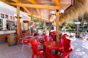 Restaurace v ubytování Arcobaleno Village