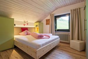 Postel nebo postele na pokoji v ubytování Bergchalet Hotel Reinerhof