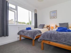 Ένα ή περισσότερα κρεβάτια σε δωμάτιο στο Small Hillman