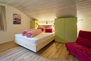 Postel nebo postele na pokoji v ubytování Bergchalet Hotel Reinerhof