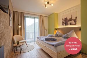Postel nebo postele na pokoji v ubytování Bergchalet Hotel Reinerhof
