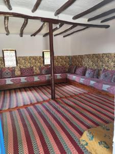 Кровать или кровати в номере Maison d'hôte traditionnelle