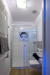 Kúpeľňa v ubytovaní Apartamenty na Piątkę