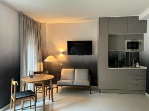 TV a/nebo společenská místnost v ubytování Orange 3 House - Chiado Studios