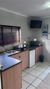 Η κουζίνα ή μικρή κουζίνα στο Lumis Rest