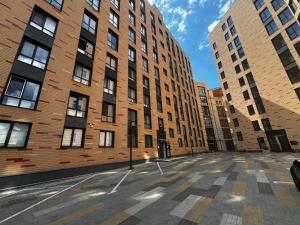an empty street in a city with tall buildings at New apartments, center, Smart TV in Kharkiv