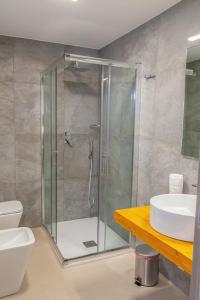 Koupelna v ubytování Isgrò Rooms