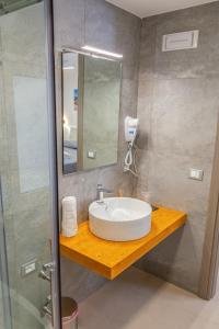 Koupelna v ubytování Isgrò Rooms