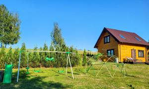 Galeriebild der Unterkunft WczasyMazurskie - Domek całoroczny " Lawenda" Mazury in Mołdzie