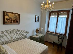 Postel nebo postele na pokoji v ubytování San Prospero Suite
