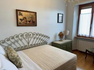 Postel nebo postele na pokoji v ubytování San Prospero Suite