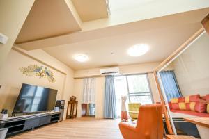 Televisyen dan/atau pusat hiburan di Lihao B&B