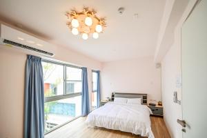 Katil atau katil-katil dalam bilik di Lihao B&B