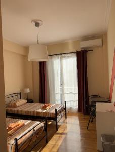 Postel nebo postele na pokoji v ubytování Petaluda House 5