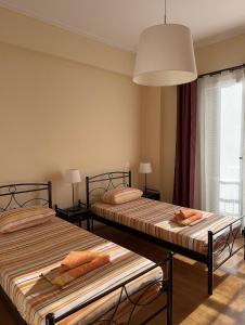 Postel nebo postele na pokoji v ubytování Petaluda House 5