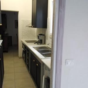 Kuchyň nebo kuchyňský kout v ubytování Lentisco B&B