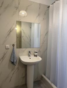 Koupelna v ubytování Petaluda House 5