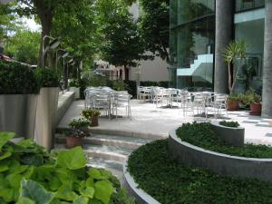A garden outside Hotel Ali d'Oro