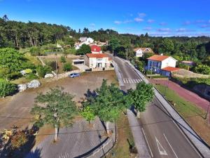 The surrounding neighborhood or a neighborhood close to the country house